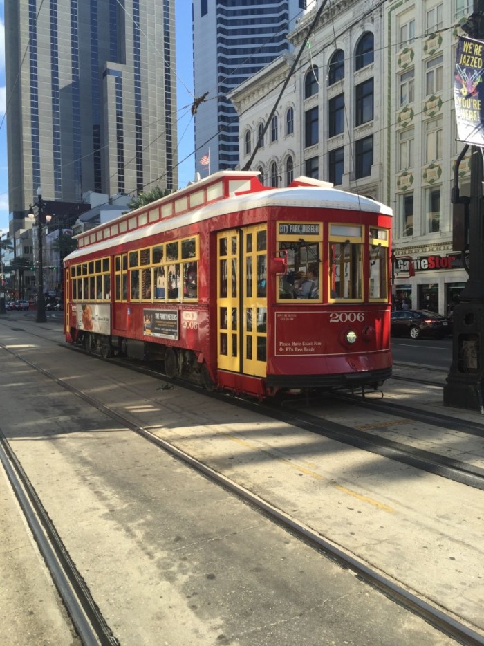 picture of a red and yellow trolley car