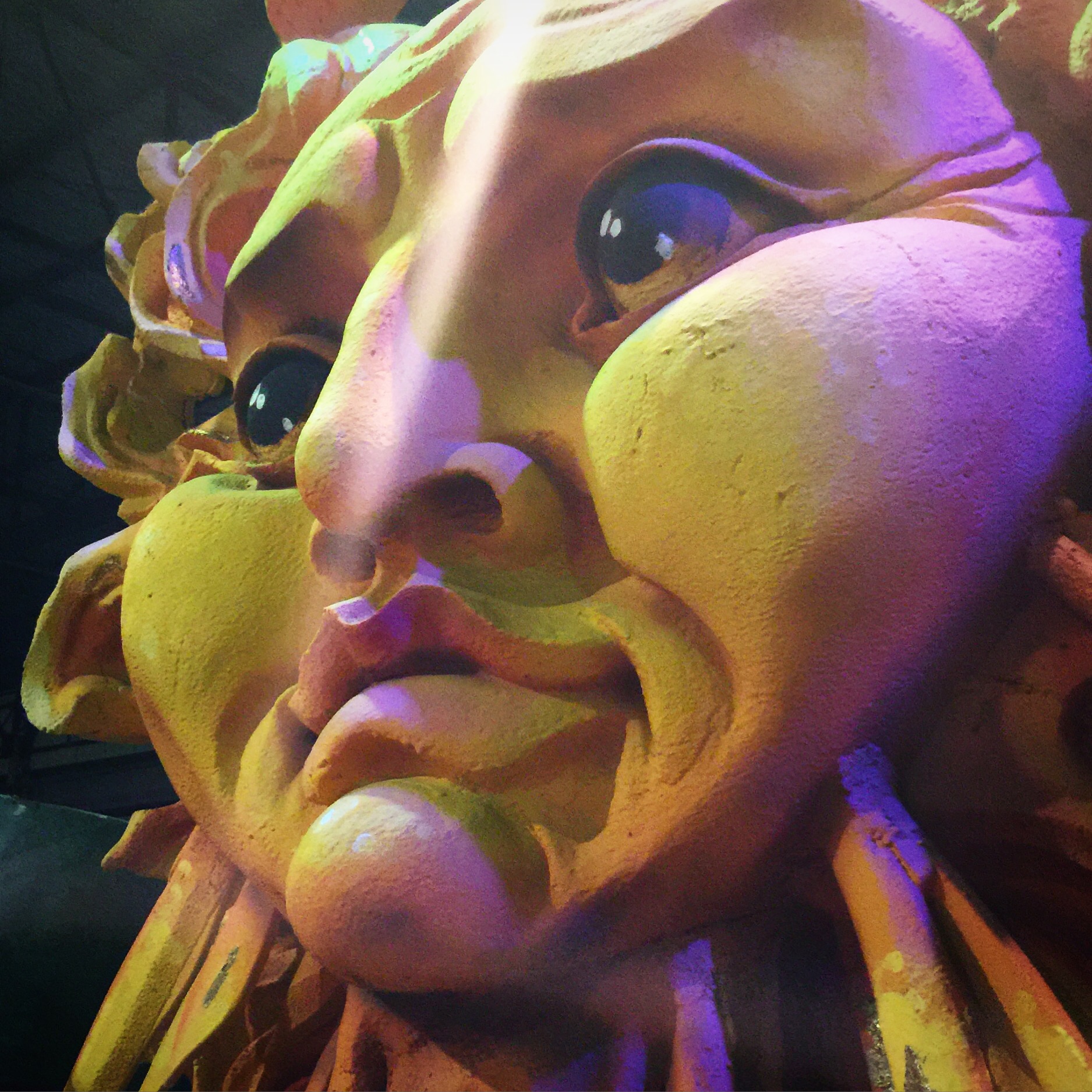 sun face sculpture at Mardis Gras World