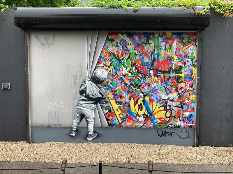 street-art-boy-curtain-graffiti